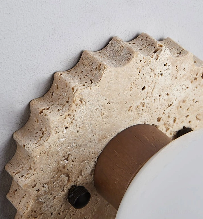 Close-up macro detail of travertine ceiling lamp base showing natural porous texture and mounting hardware