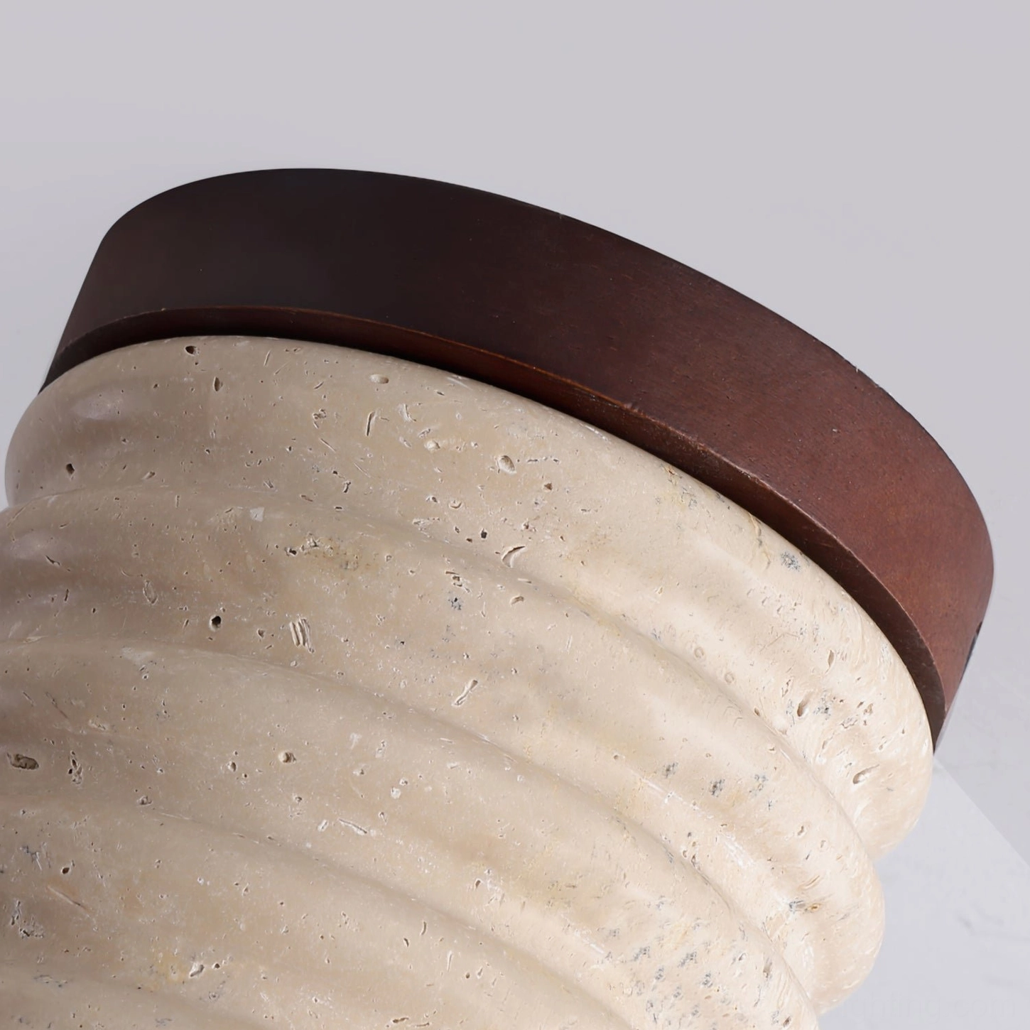 Travertine ceiling lamp mounted perspective showing flush installation and stone character