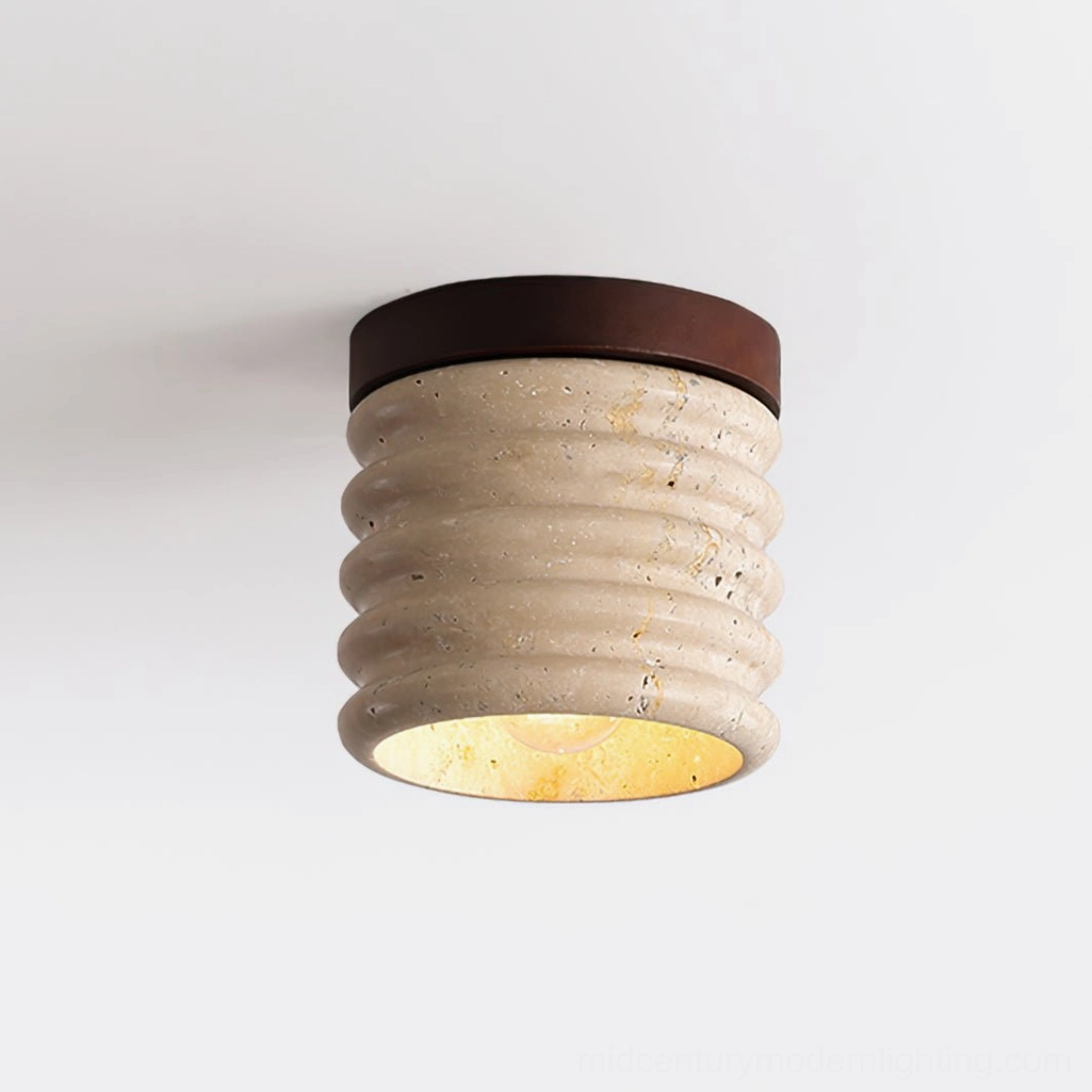 Travertine ceiling lamp in gallery or boutique retail space, curated design lighting