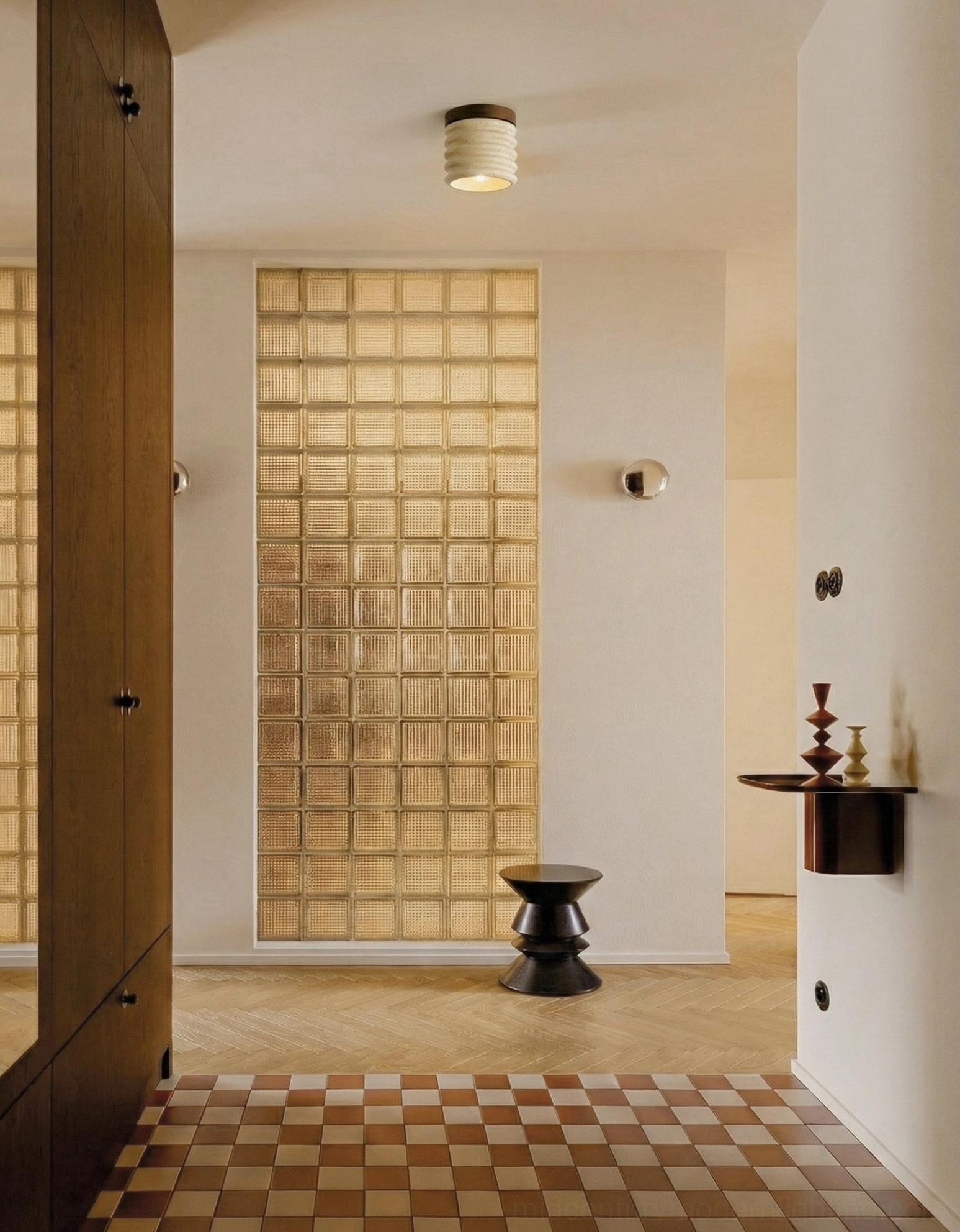 Single travertine ceiling lamp in minimalist residential foyer, modern warm neutral ambiance