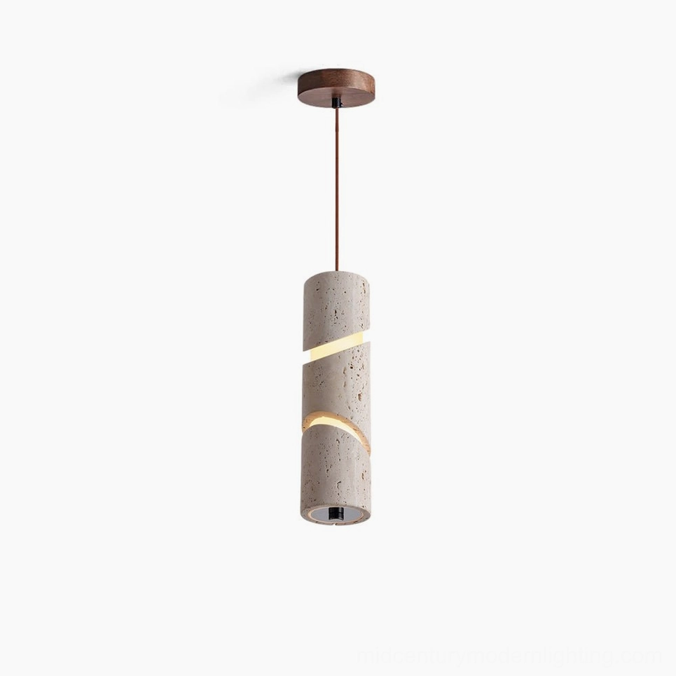 Travertine sculptural pendant lamp with spiral light cutouts shown in overhead studio view, revealing intricate carved pattern and natural stone texture