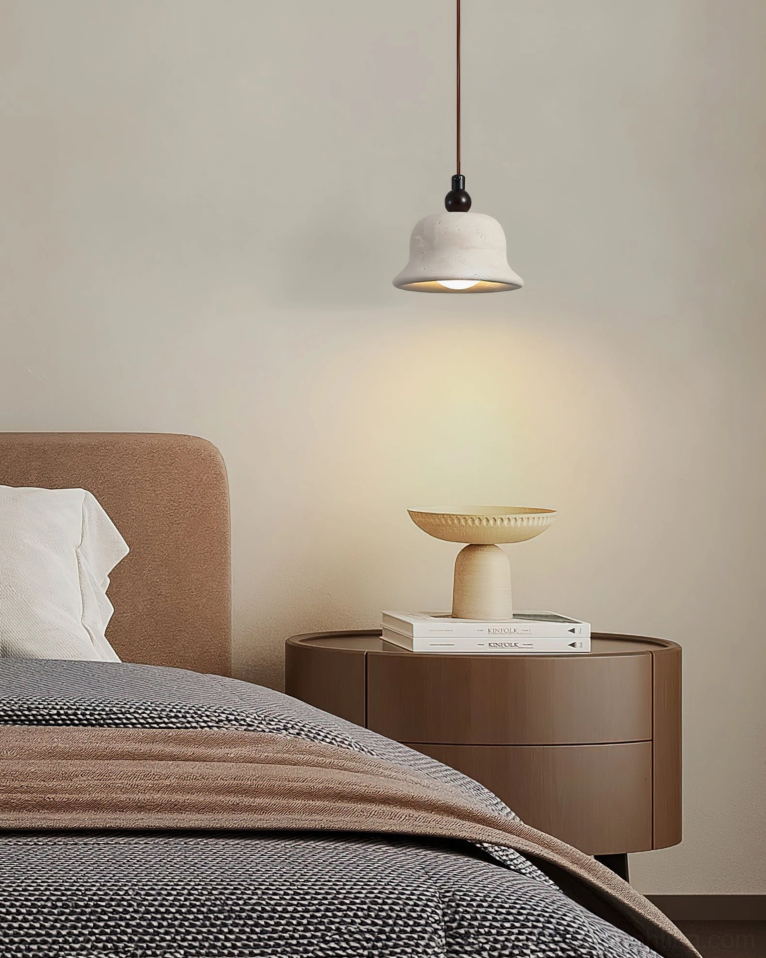 Warm travertine pendant light above wooden nightstand bedroom ambiance