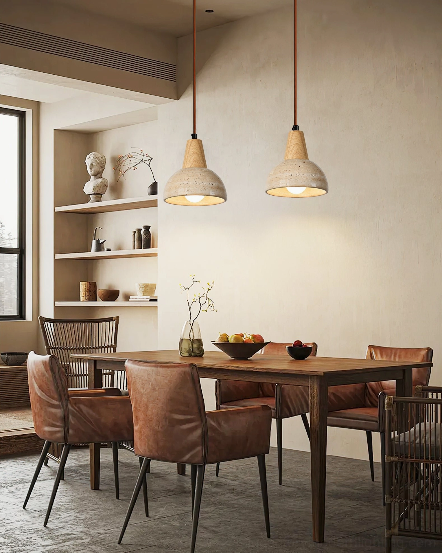 Dual travertine stone pendant lamps above formal dining room table with warm minimalist home decor