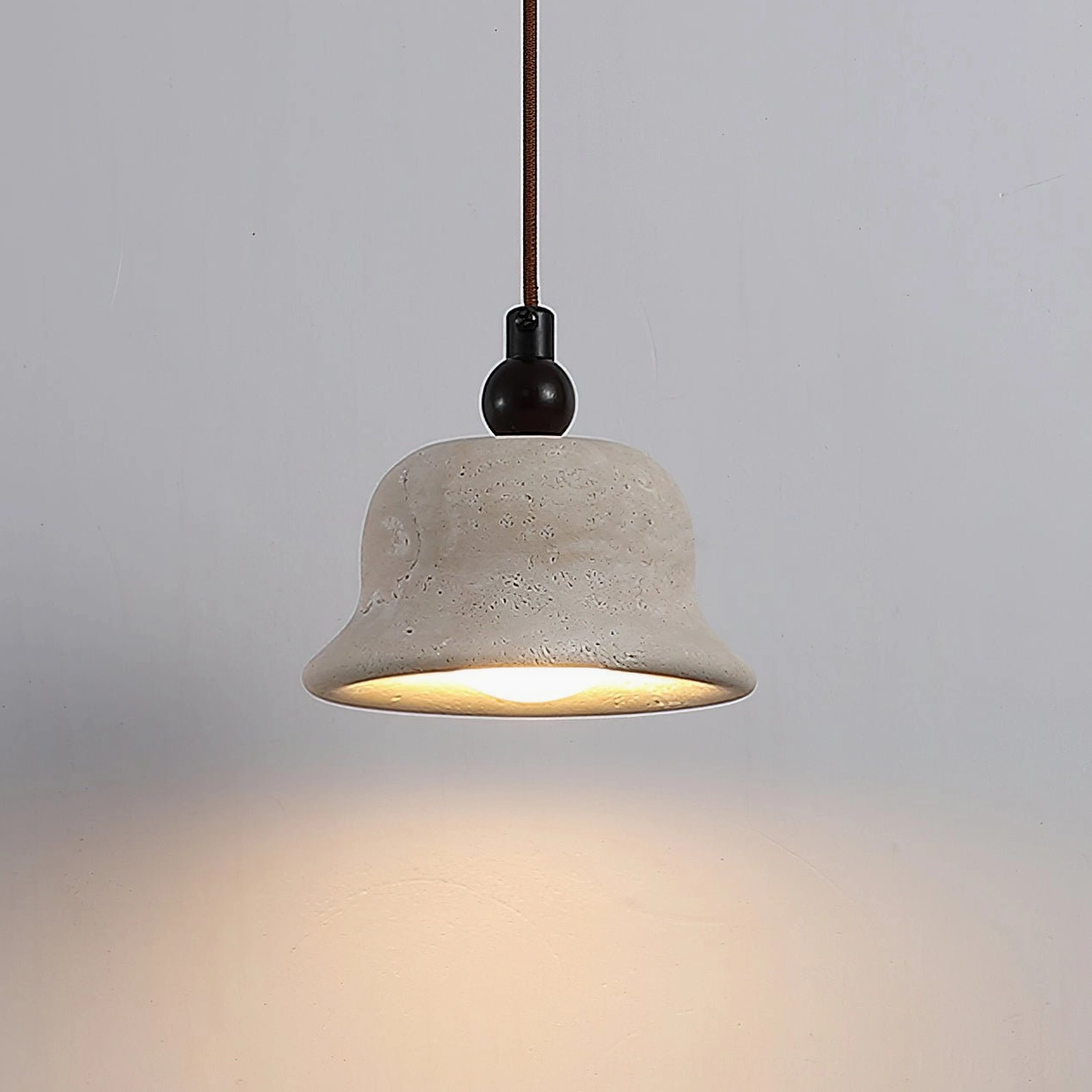 Travertine stone pendant light with open bottom design warm illumination
