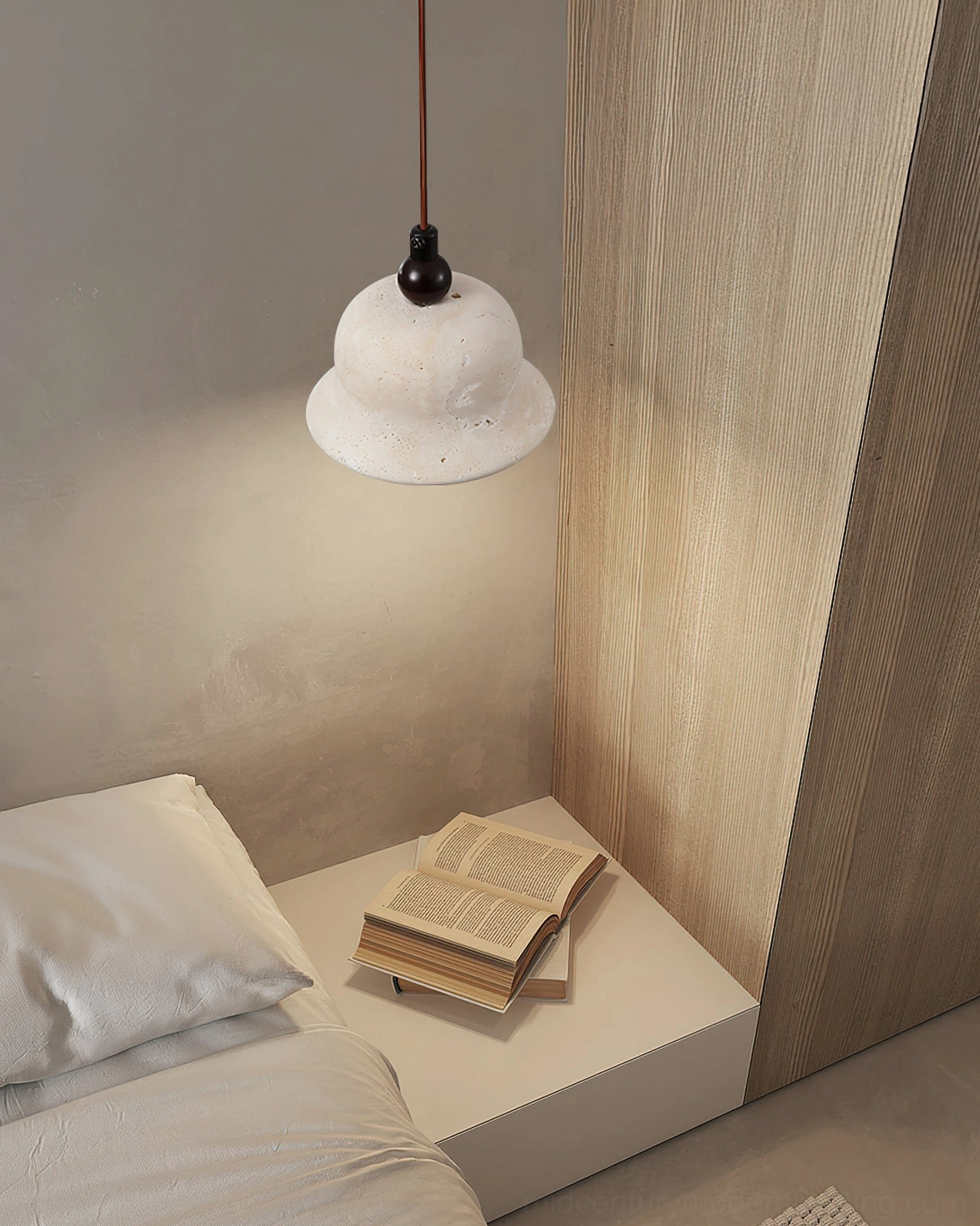 Travertine bell pendant with textured shade and warm downlight in bedroom nook