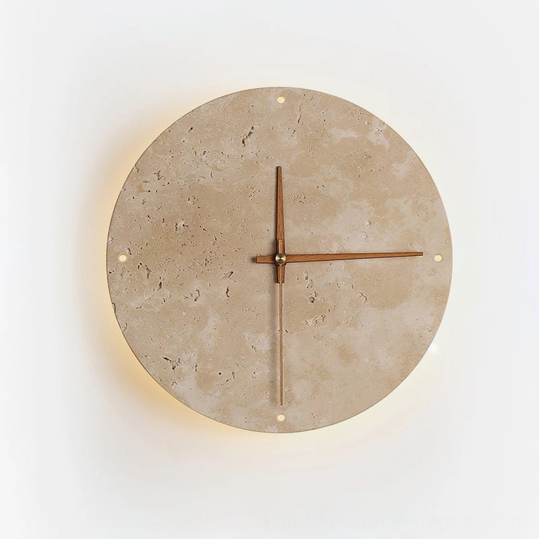 Travertine wall clock lamp with backlight glow illuminating natural stone markers on minimalist white background