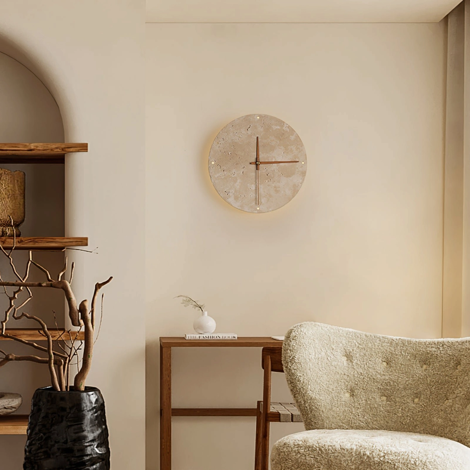 Travertine wall clock lamp in lounge setting with wooden shelves and tufted chair creating warm ambiance