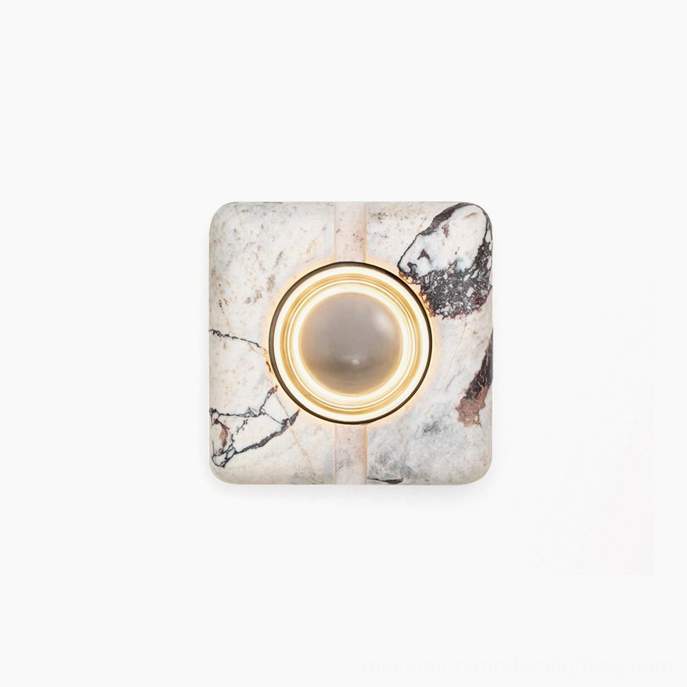 Rectilinear travertine wall lamp front view unlit showing natural stone veining and minimalist design