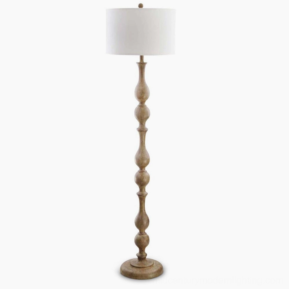 Tremblay turned wooden floor lamp with white fabric shade, studio front view showing full sculptural base and drum shade