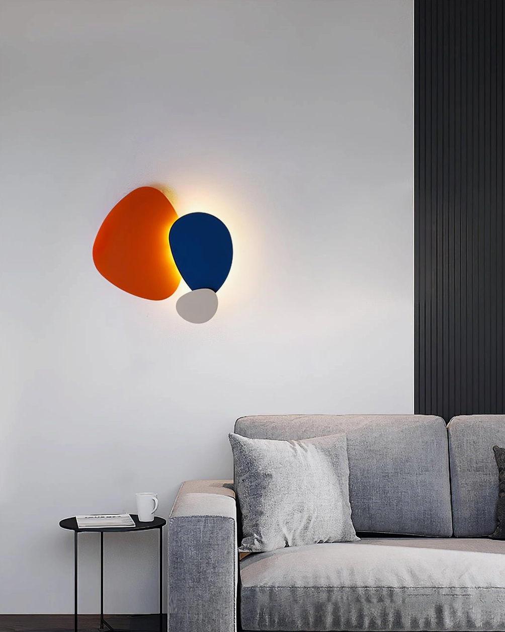 Tria wall light in various color options showing design flexibility for different interior aesthetics