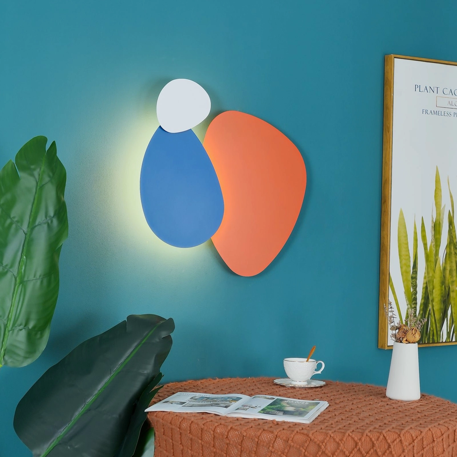 Tria geometric wall lamp displaying innovative LED plate technology and integrated connection design