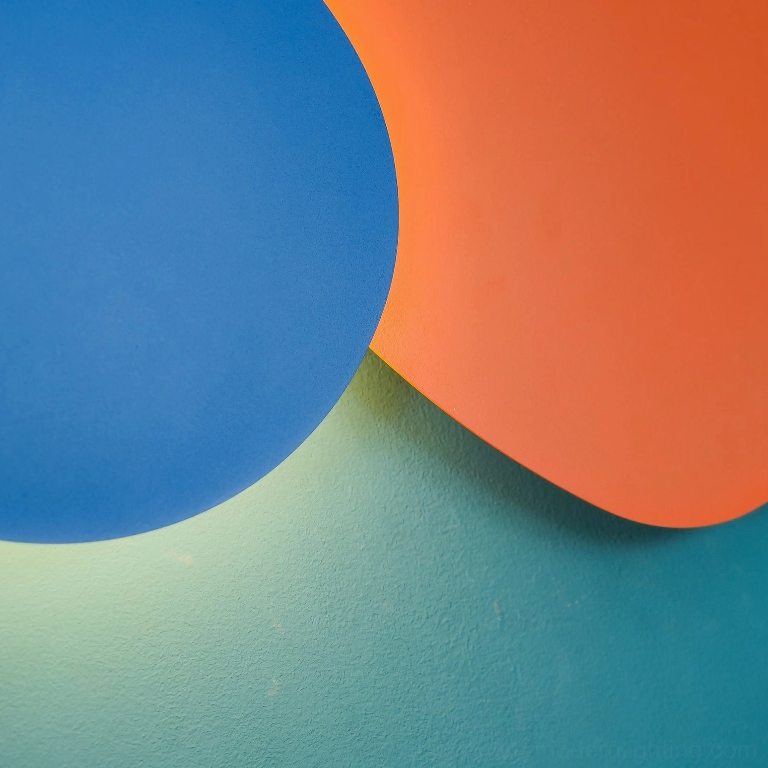 Tria geometric LED wall lamp demonstrating scalable modular design for various room sizes