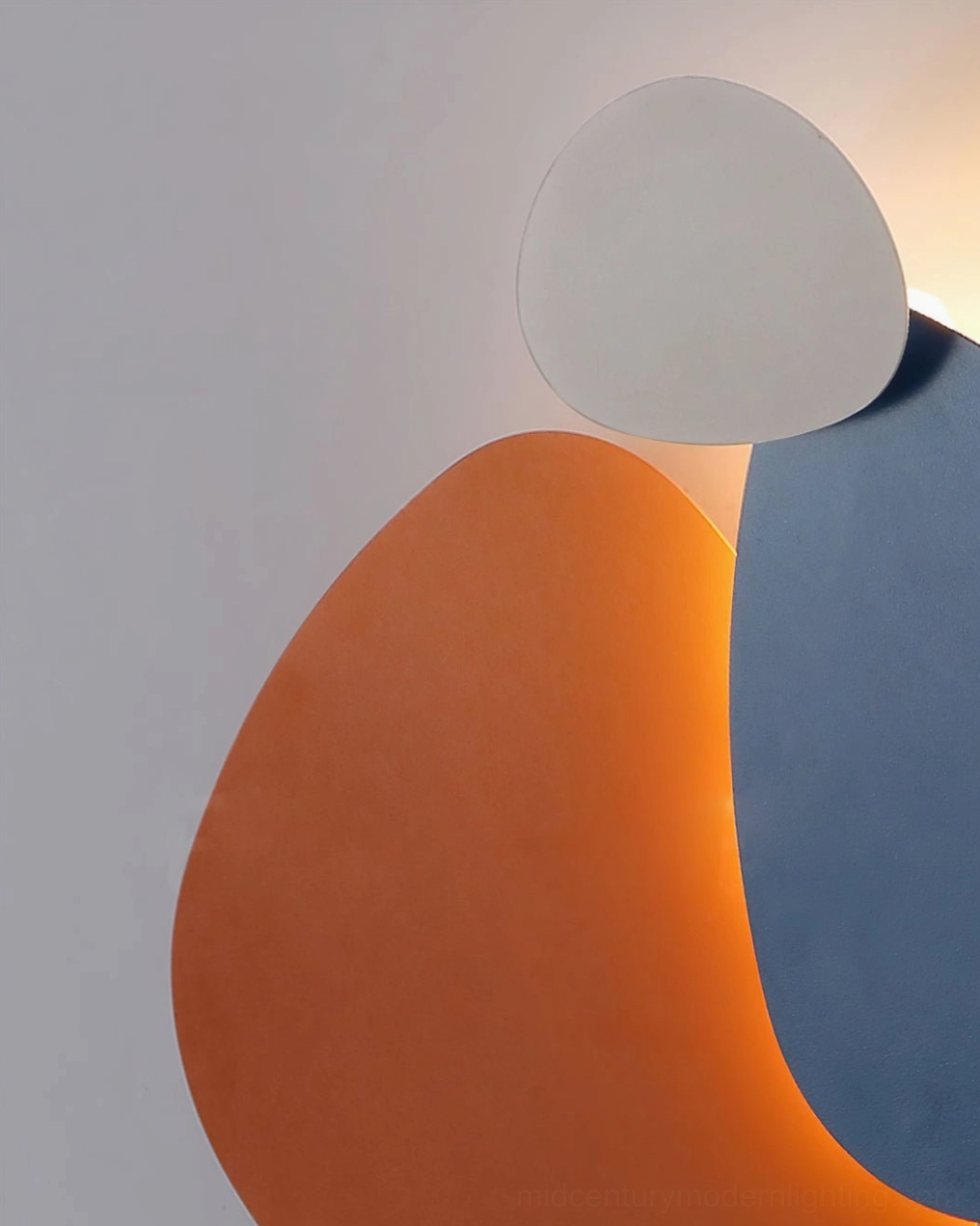 Tria wall light showcasing durable metal and acrylic materials with long-lasting LED performance