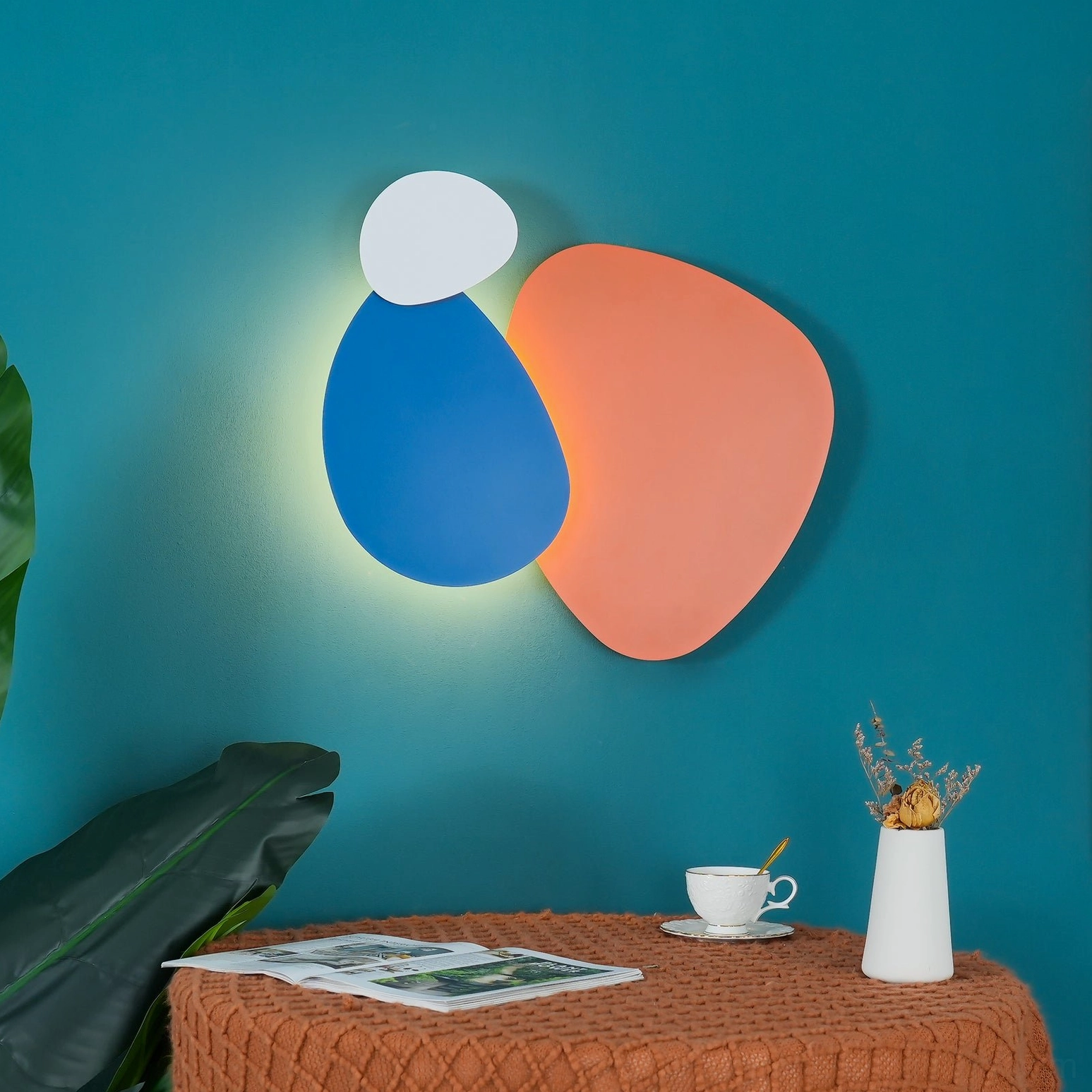 Tria contemporary wall light showcasing minimalist form and architectural presence in modern space