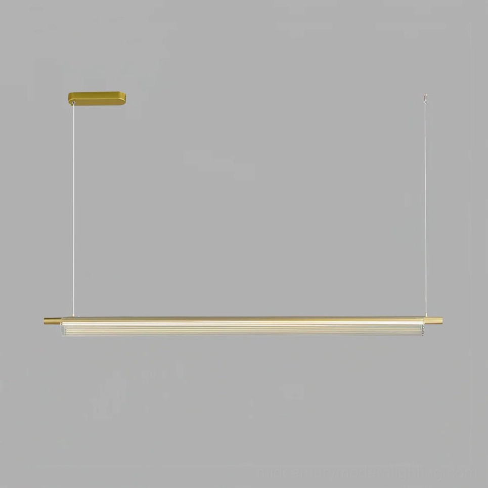 Trisel mid-size linear pendant light in brushed gold, 52.4 inches, suitable for standard dining tables and residential spaces