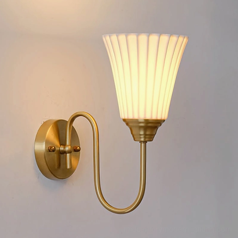 Trumpet ceramic wall sconce in brass finish - mid-century modern wall-mounted light fixture