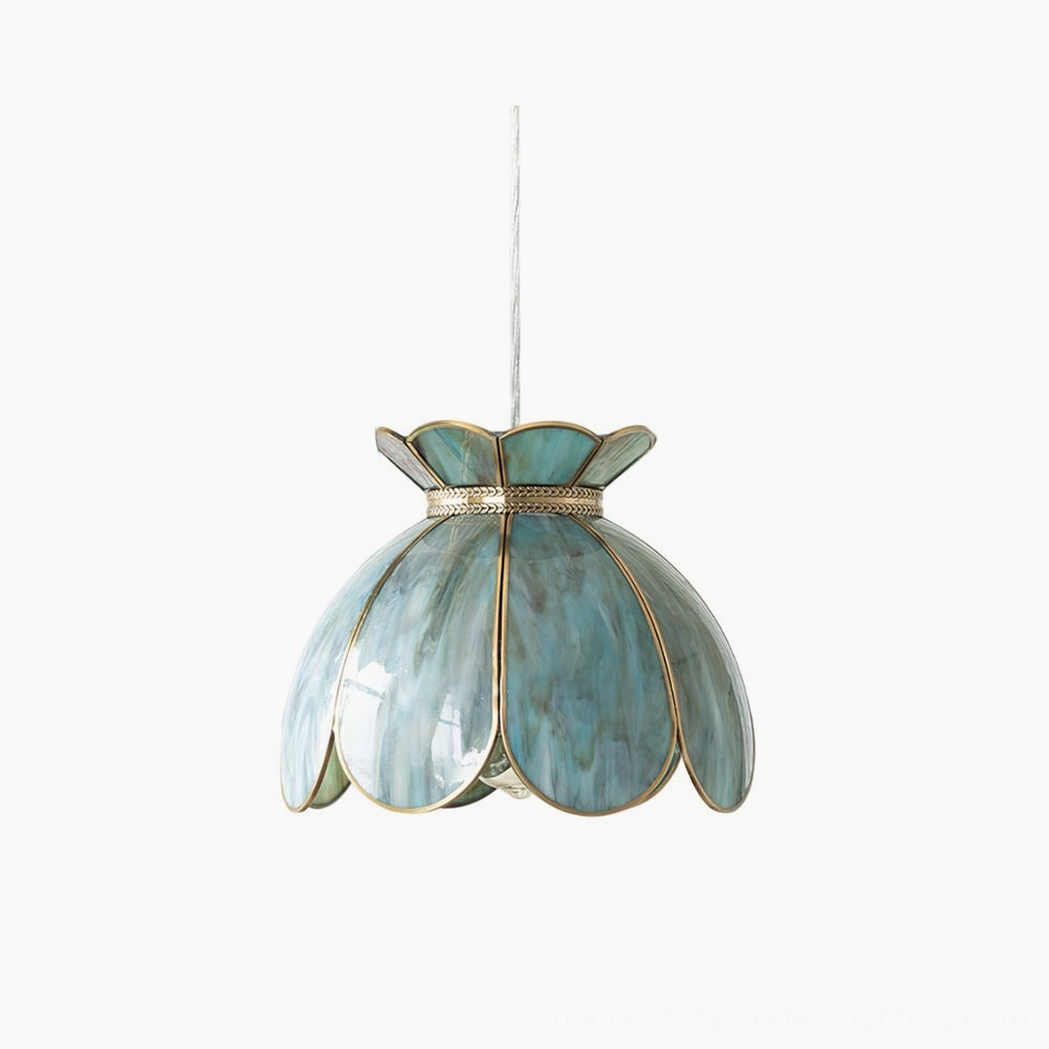 Turrella botanical glass pendant light with blue-tinted petal shade and brass hardware on white background