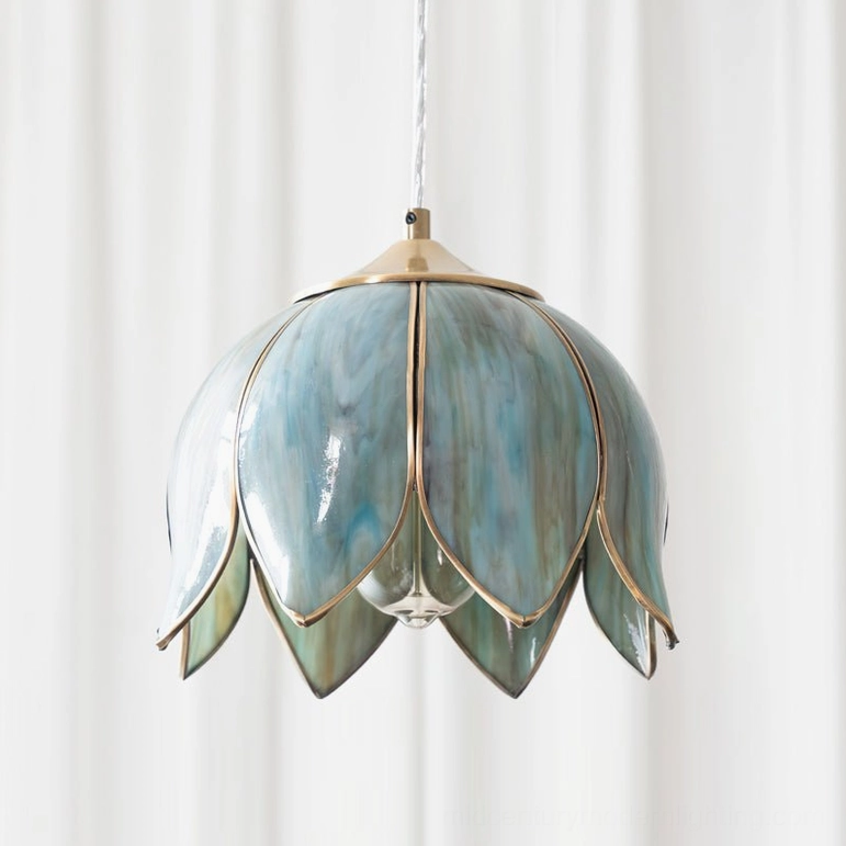 Turrella glass pendant light showing brass suspension and warm light diffusion