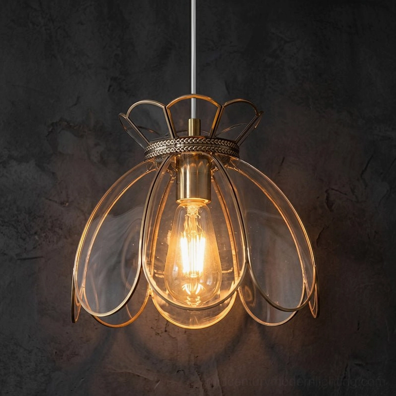 Turrella Model A clear and brass pendant light showing larger size proportions and light quality