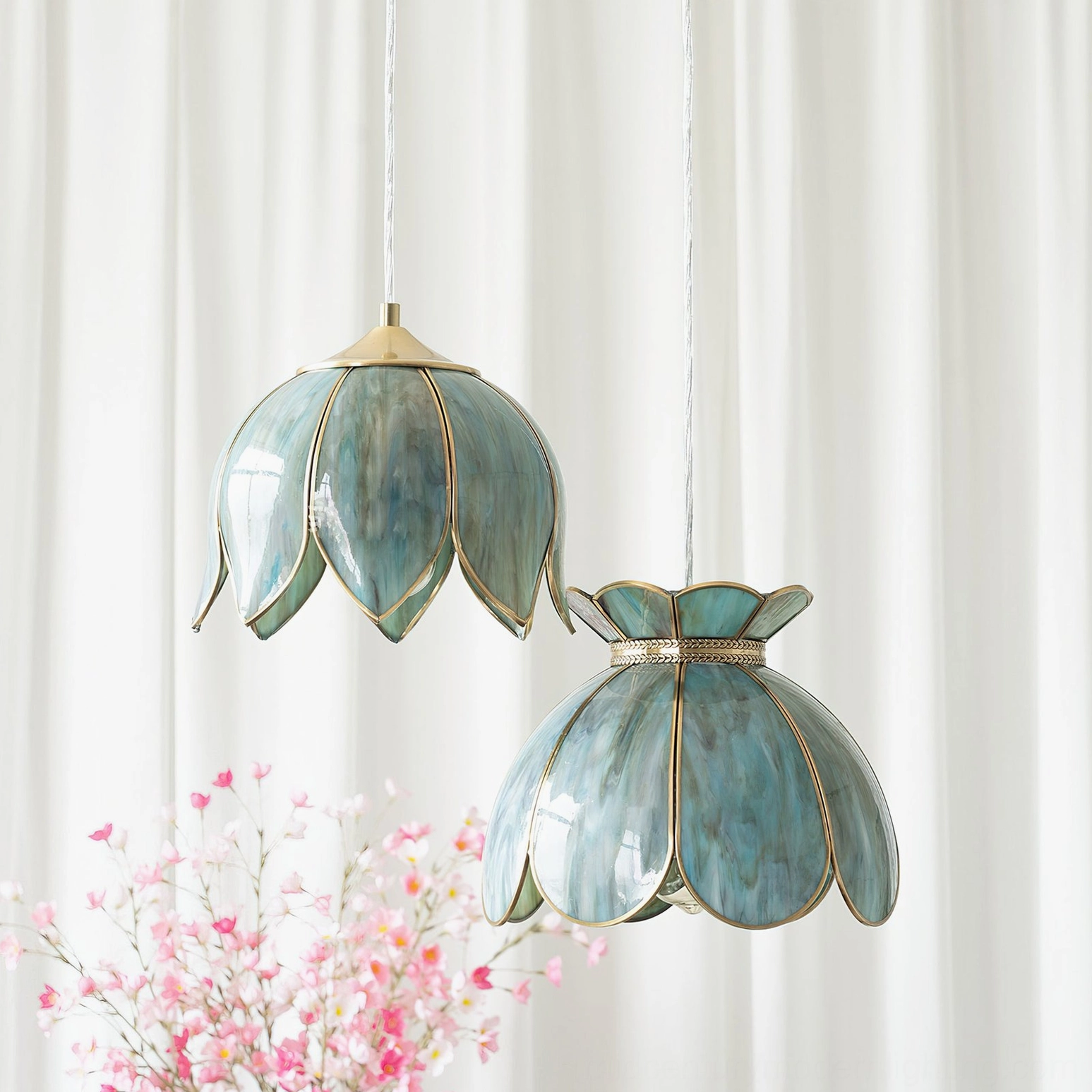Model A Turrella botanical pendant light with clear glass showing full shade proportions