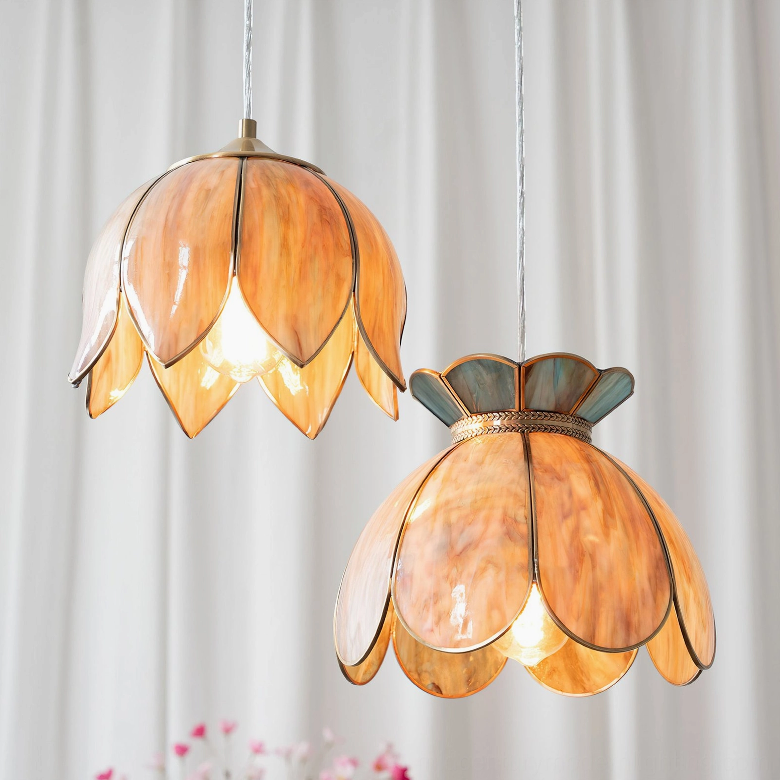 Model B Turrella botanical pendant light with blue glass shade in intimate scale
