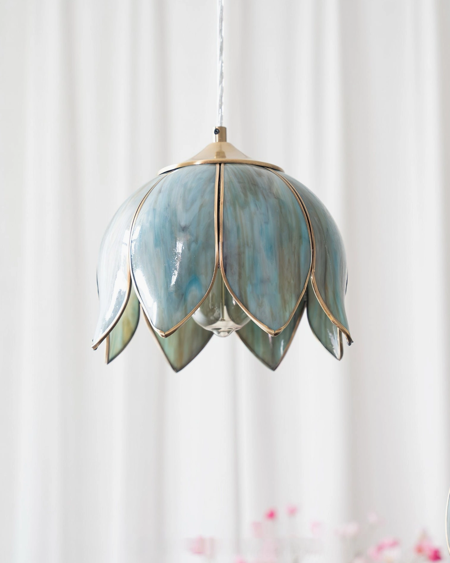 Turrella glass pendant light model comparison showing size variation and design consistency