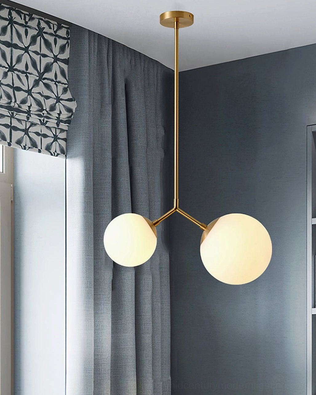 Twis brass and glass pendant lamp installation example in contemporary home interior