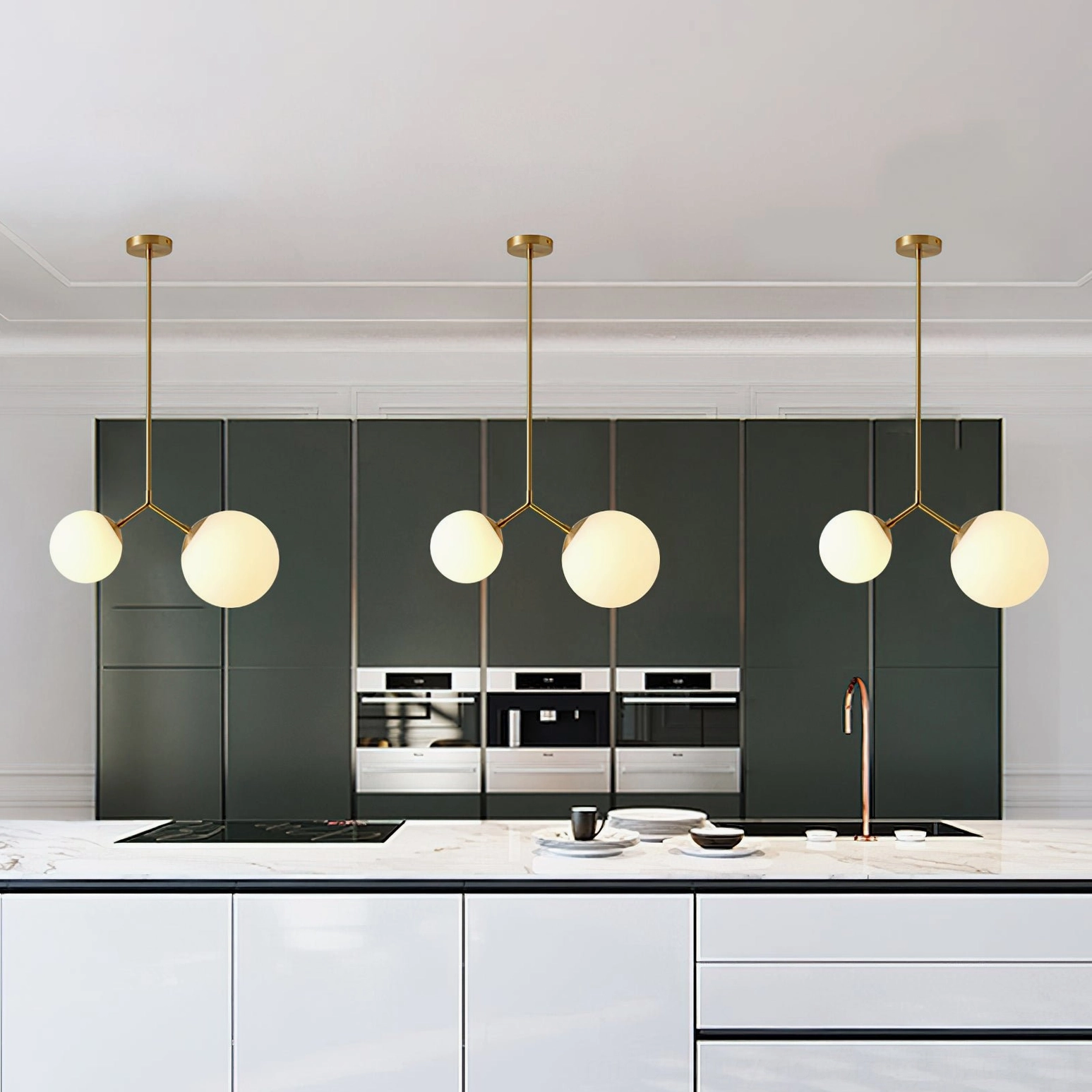 Multiple Twis brass pendant lights in modern open concept kitchen creating layered contemporary illumination