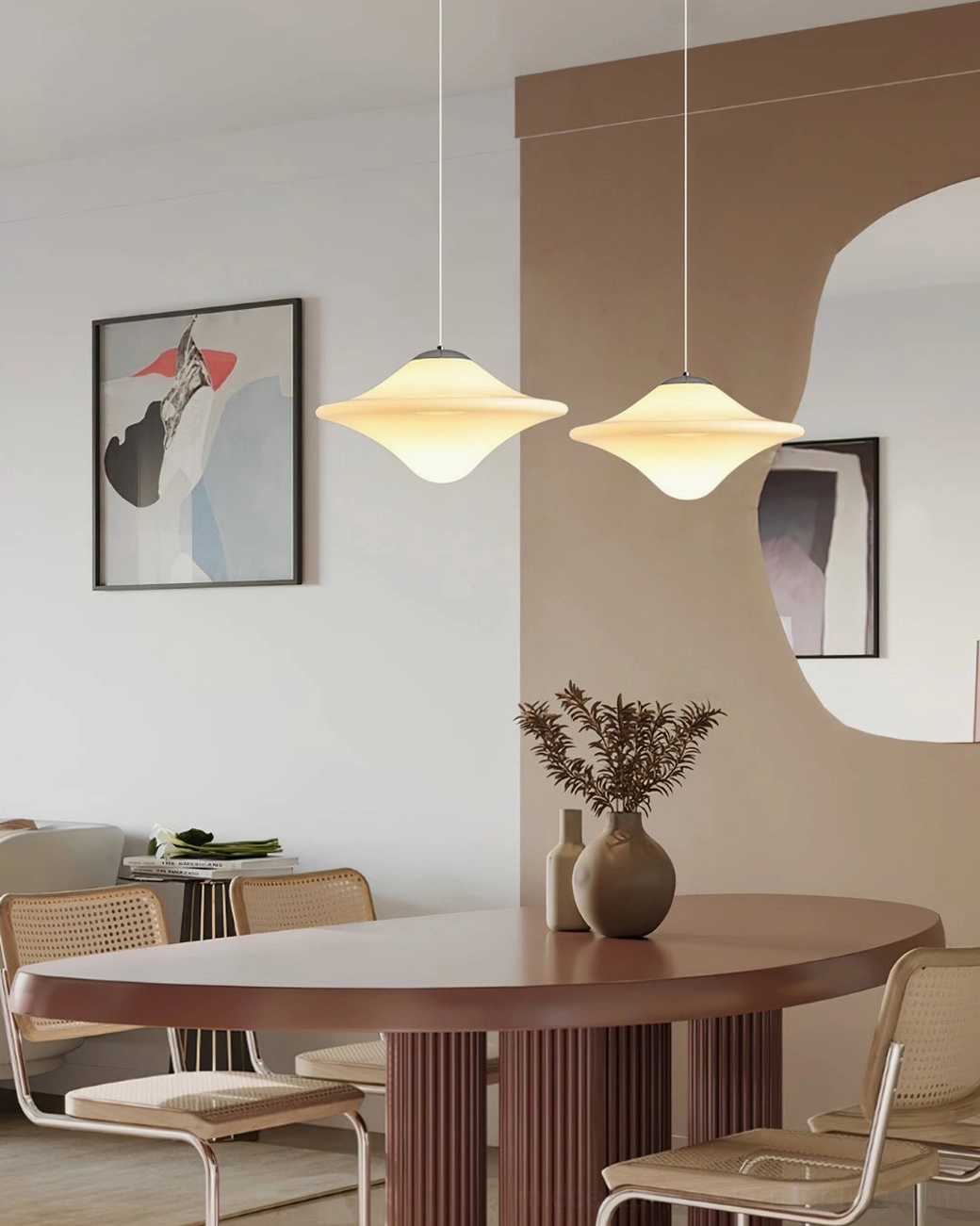 Twisted disc pendant shade demonstrating light diffusion and opaline material quality