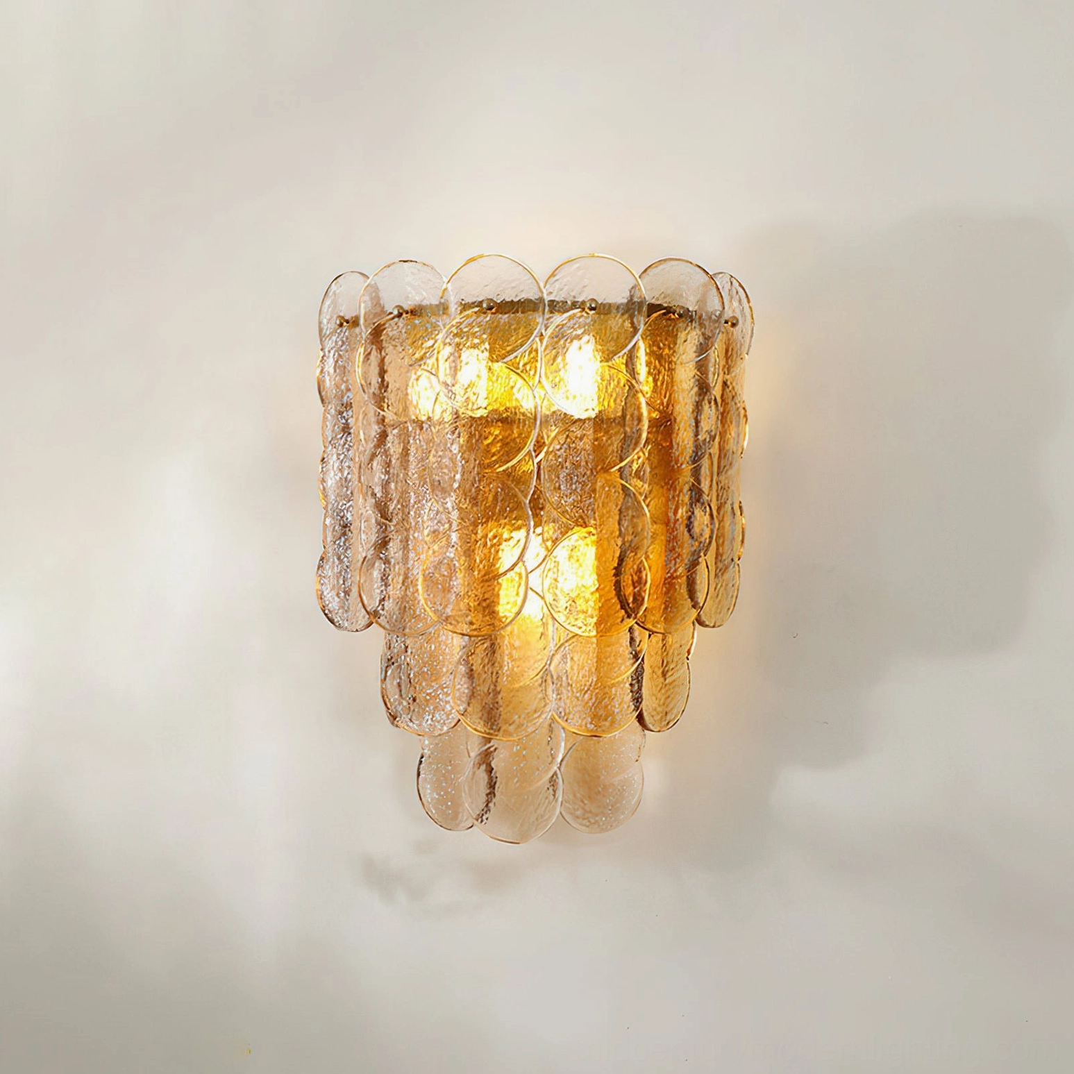 Unlit scalloped tiered glass wall lamp with dark amber panels showcasing architectural design
