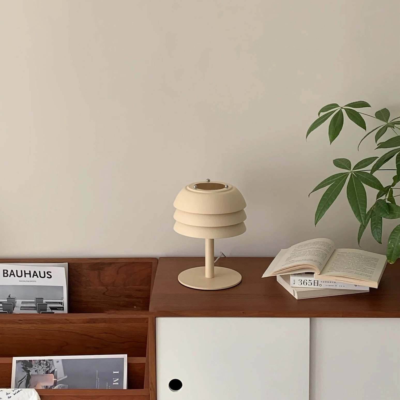 Valencia cream tiered table lamp minimalist studio shot on white background, clean modern lighting product