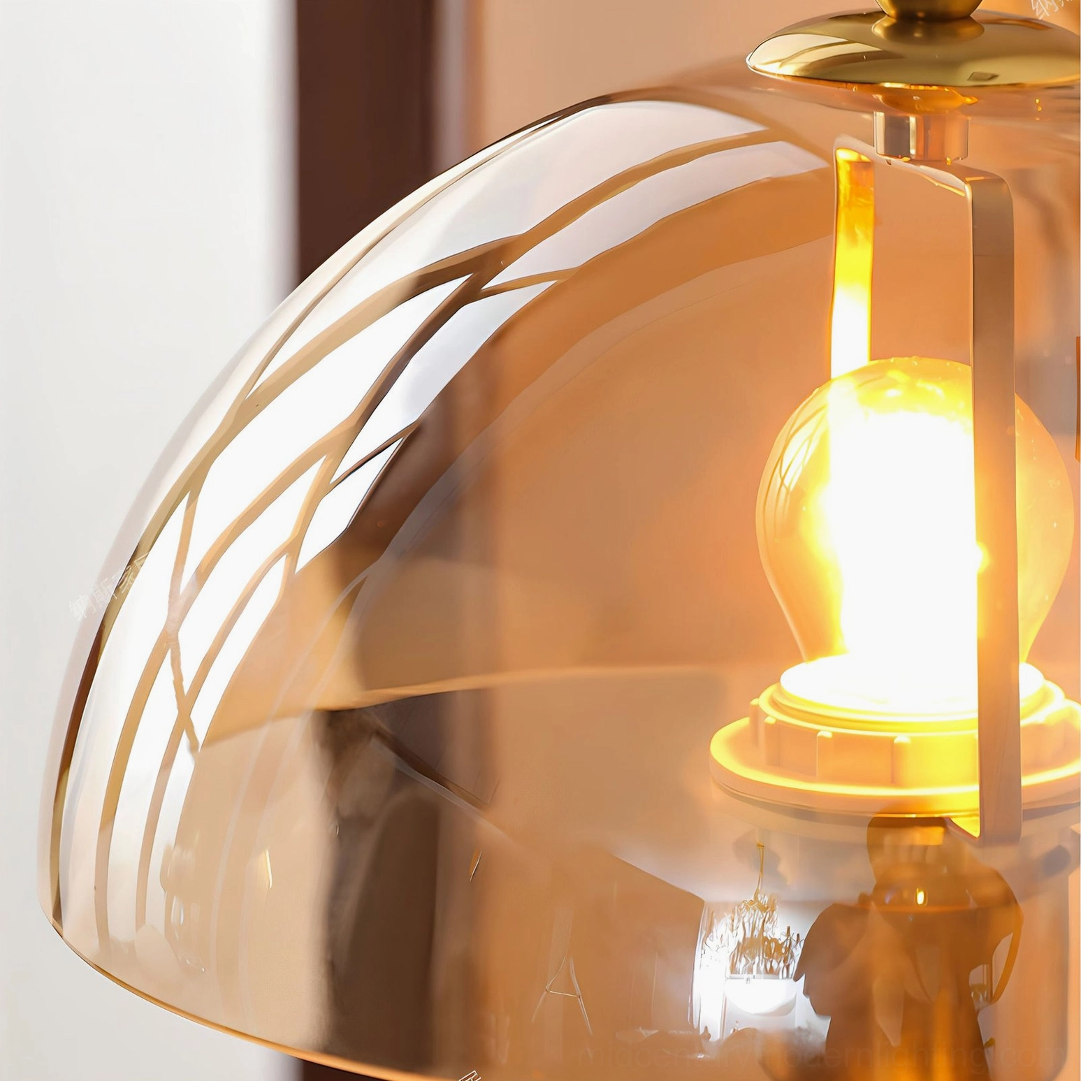 Valeska lamp amber dome glass shade and brass collar detail with illuminated filament bulb