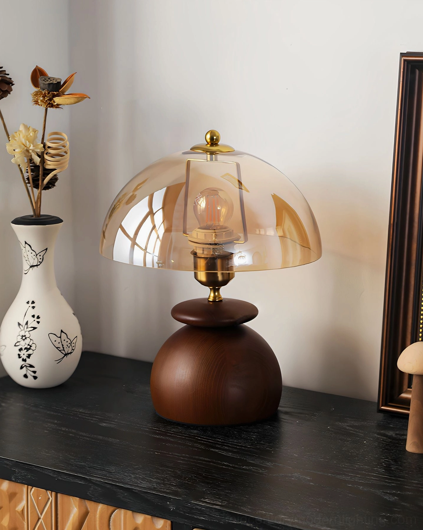 Valeska mushroom lamp left side view on vintage console with home decor accessories