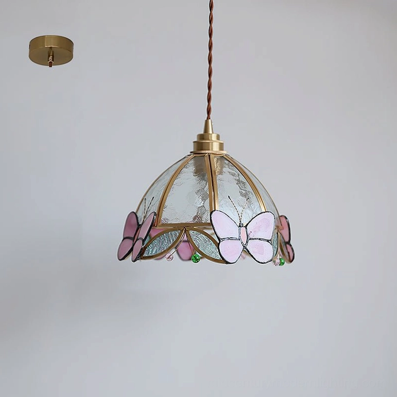 Bottom-up view of Valinte stained glass butterfly pendant lamp showing ceiling mount base and mixed pink butterfly decorative panels against white studio background