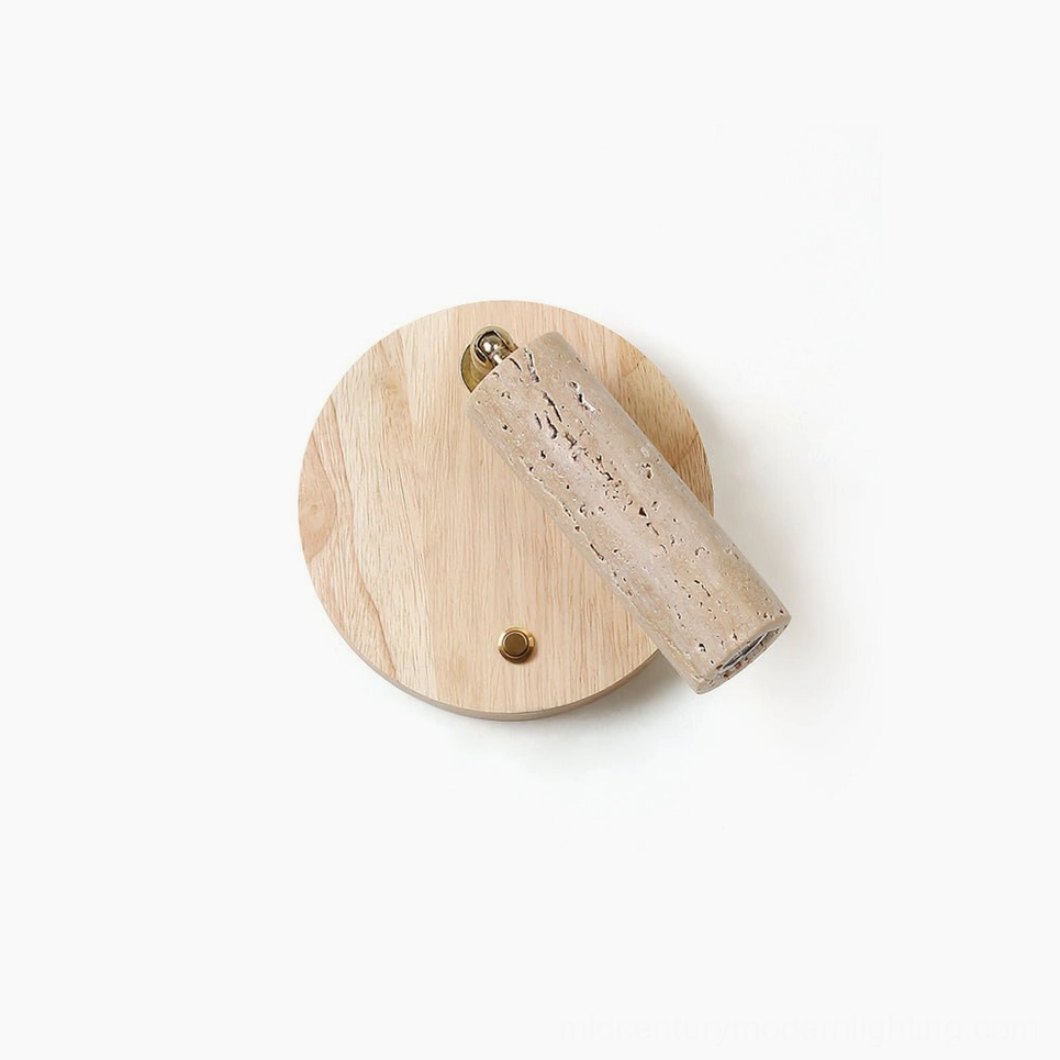Veda travertine wall sconce overhead view with natural wood backplate and porous beige stone cylinder on white background