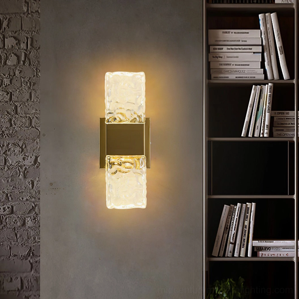 Dual Vega wall sconces above bookshelf in contemporary study, demonstrating luxury minimalist lighting design
