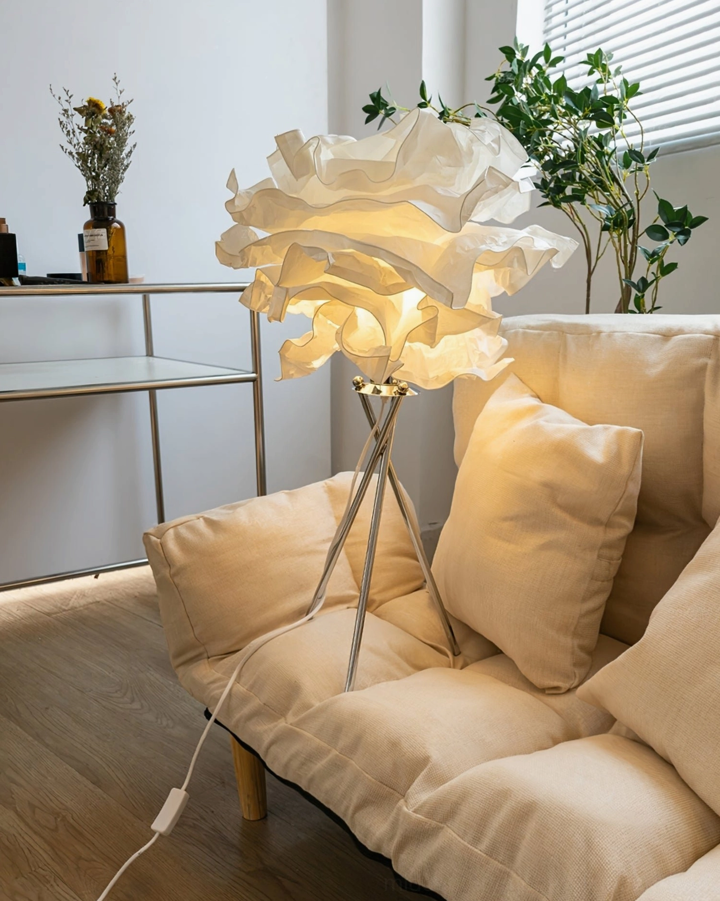 Veli handcrafted paper table lamp full view showcasing sculptural cloud-inspired design with chrome metal base and diffused ambient lighting