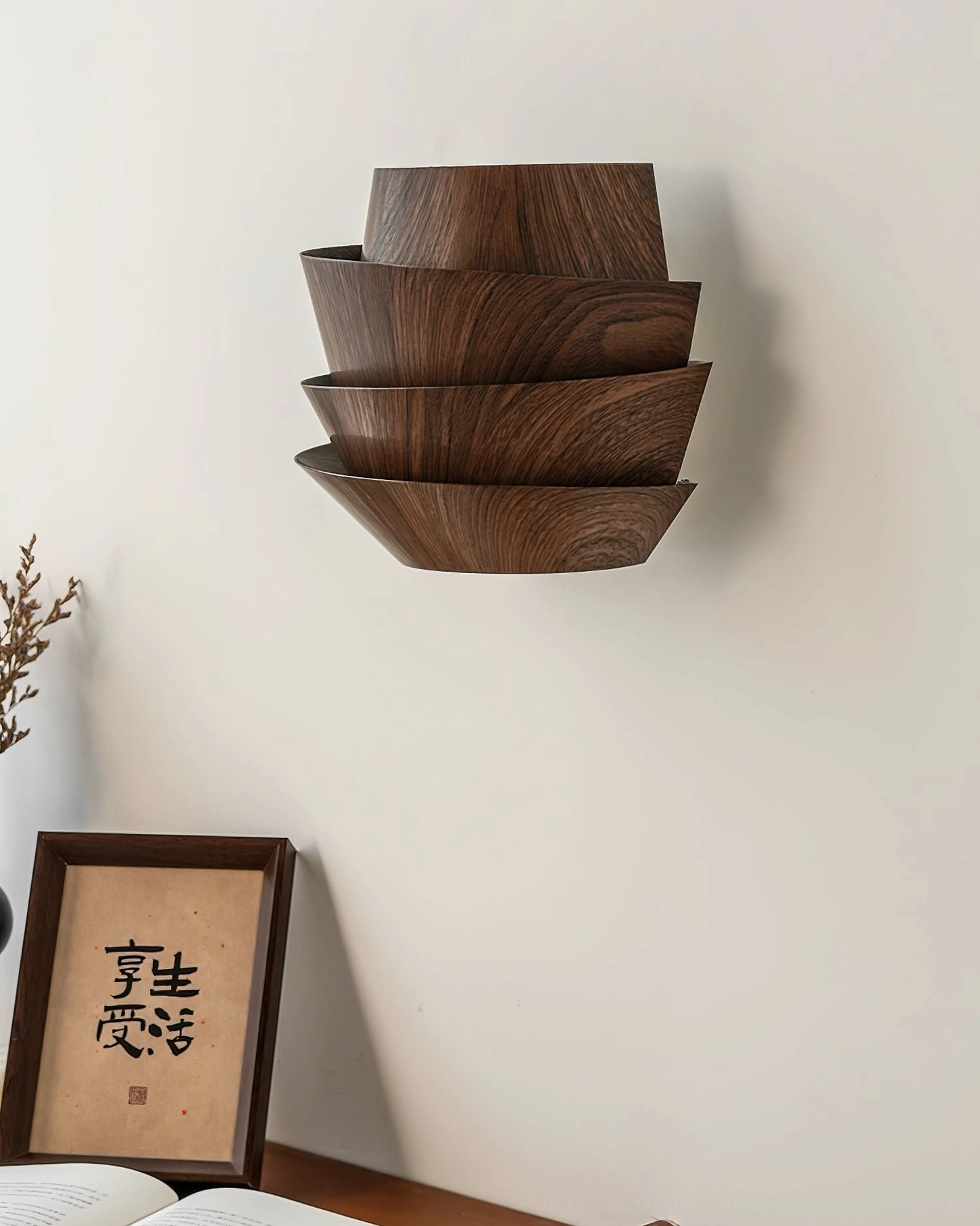 Veneer metal wall sconce flat angled shot with framed calligraphy and dried plant decorative elements