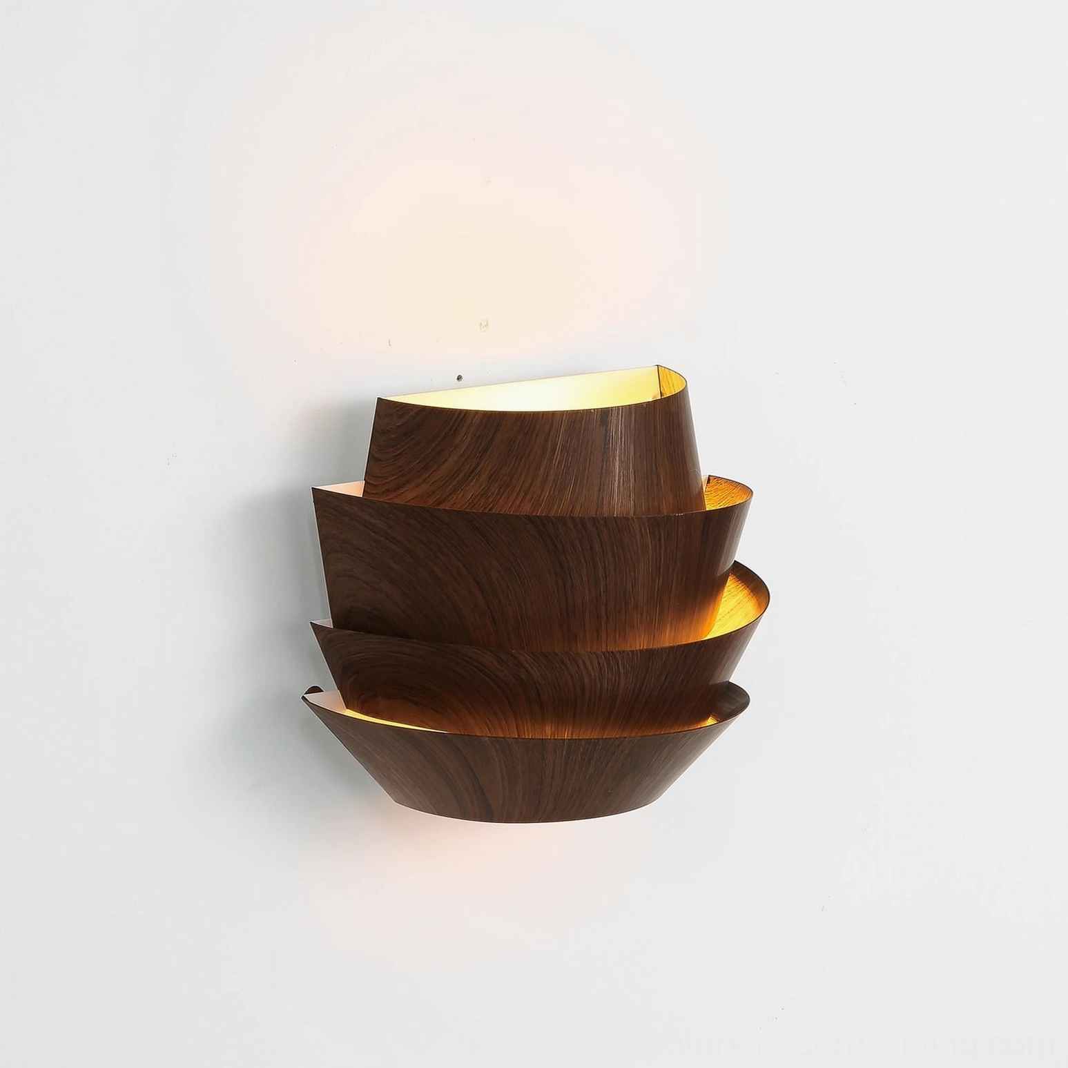 Veneer wood grain wall sconce side angled overhead shot showing layered panel construction and warm gap-emitted light