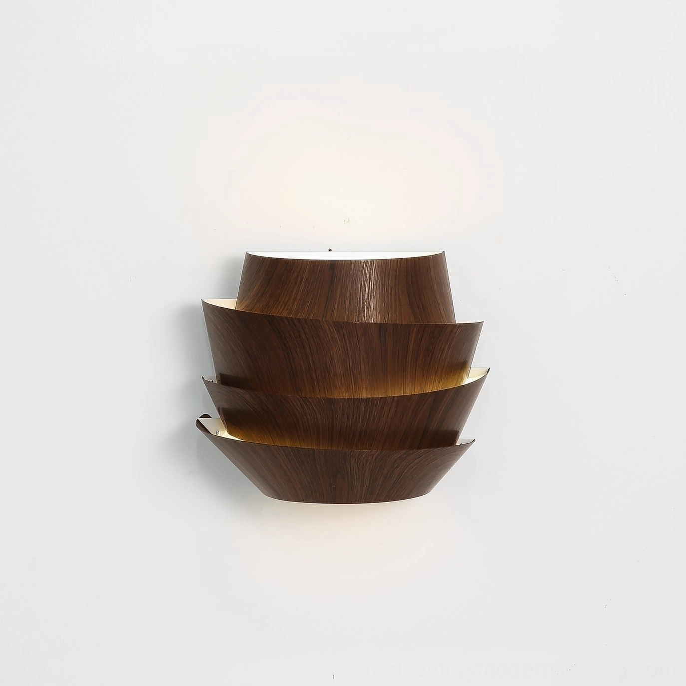 Veneer wall lamp frontal studio shot pure white background stacked curved wood design warm top lighting