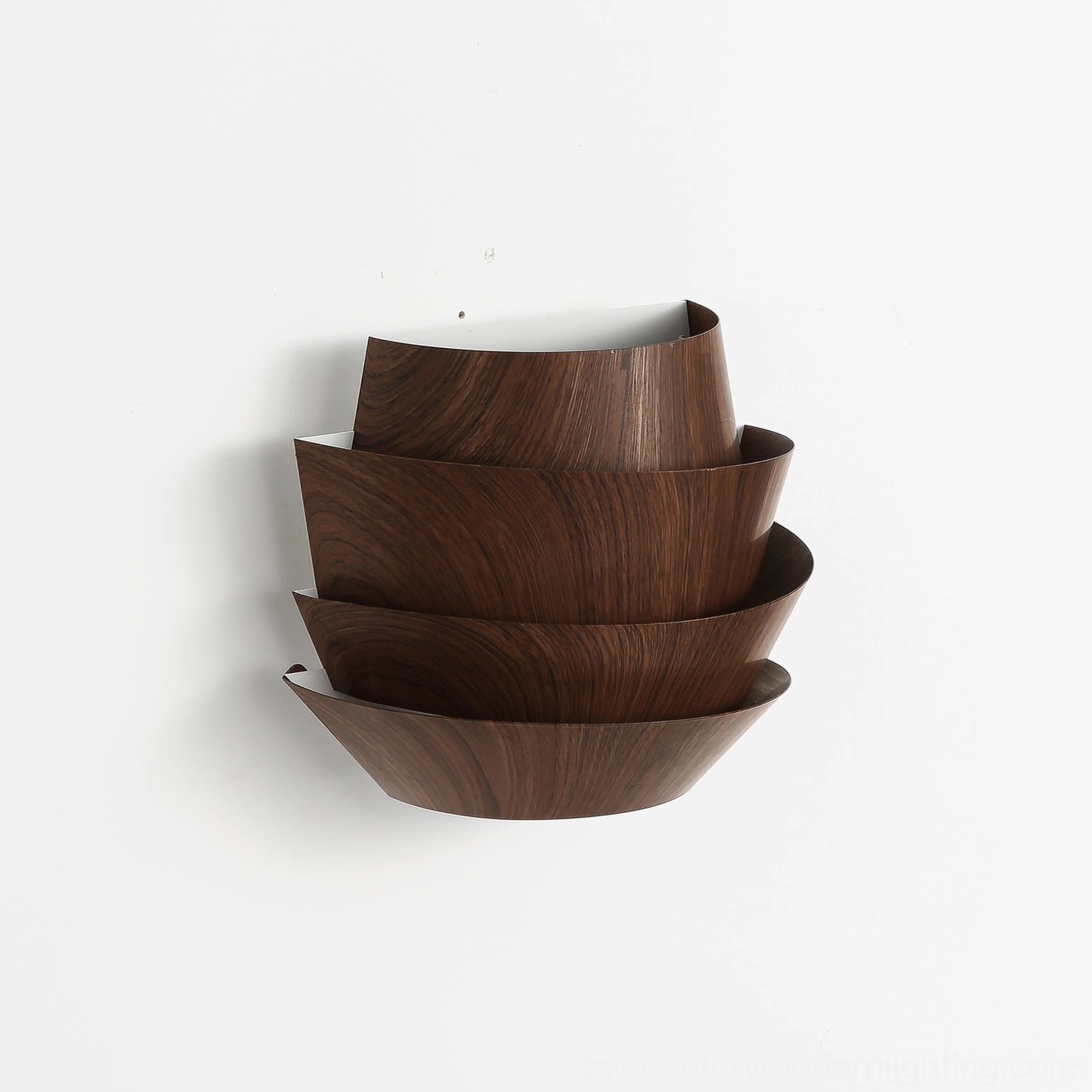 Veneer wall sconce dimensional view showing three-dimensional sculptural panel layering effect