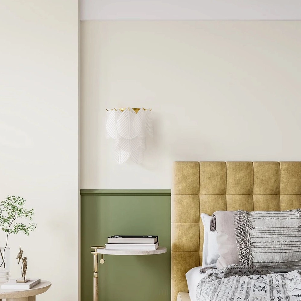 Compact Verbier gold sconce with white frosted glass on minimalist green bedroom wall