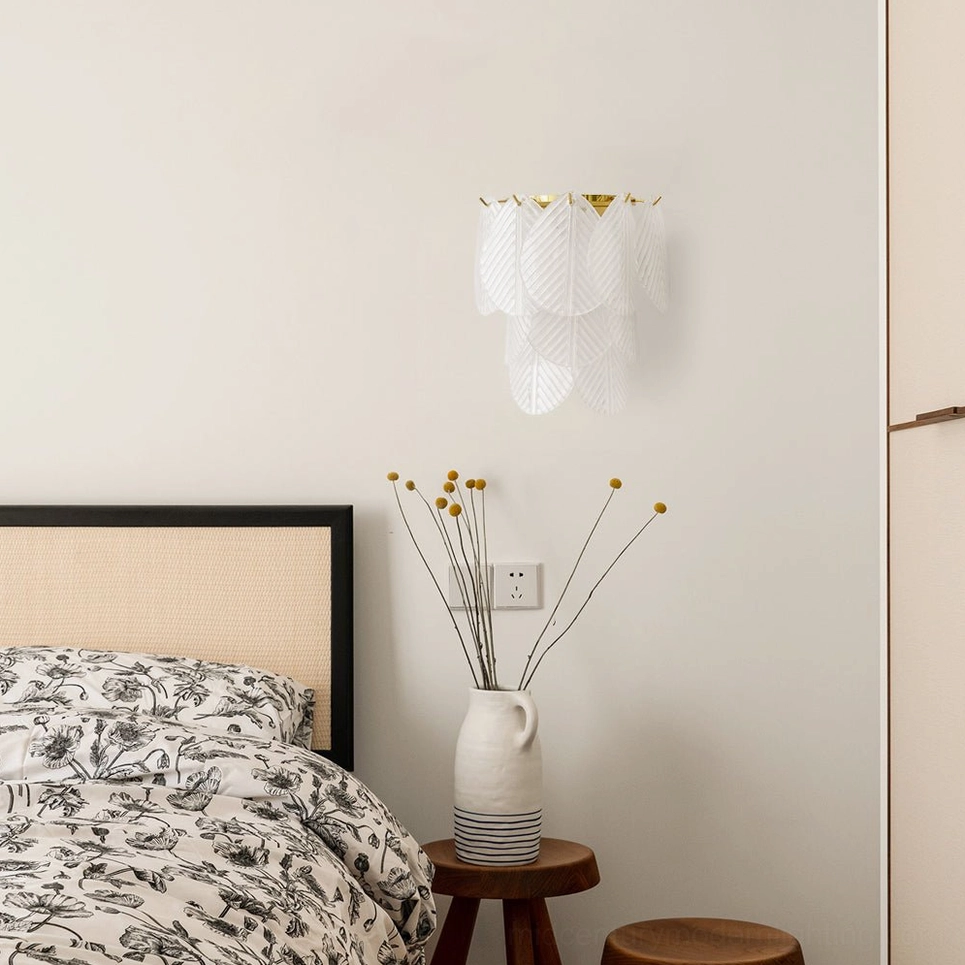 Verbier wall lamp installed in modern farmhouse bedroom above nightstand with warm ambient lighting