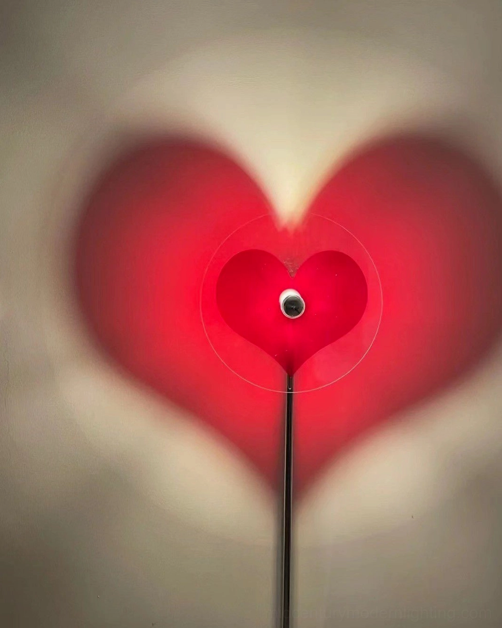 Heart-shaped floor lamp showcasing versatile design application in various contemporary interior settings