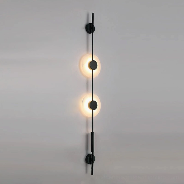 Compact two-light vertical alabaster wall lamp in matte black with 5.9 inch width dimension shown on white studio background