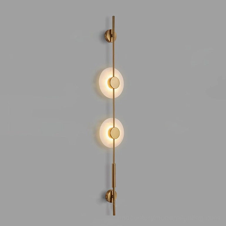 Compact two-light vertical alabaster wall lamp in warm gold finish with small footprint design for space-conscious modern interiors