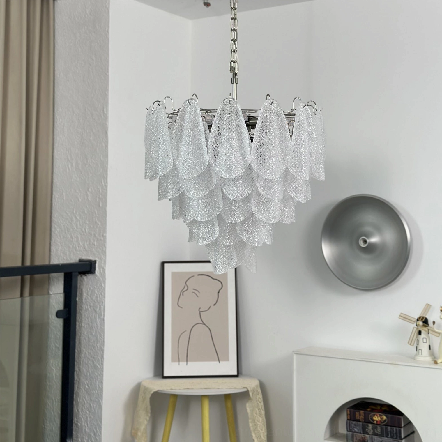 Vianna murano-style ripple glass chandelier in transitional interior design setting with mixed furnishings