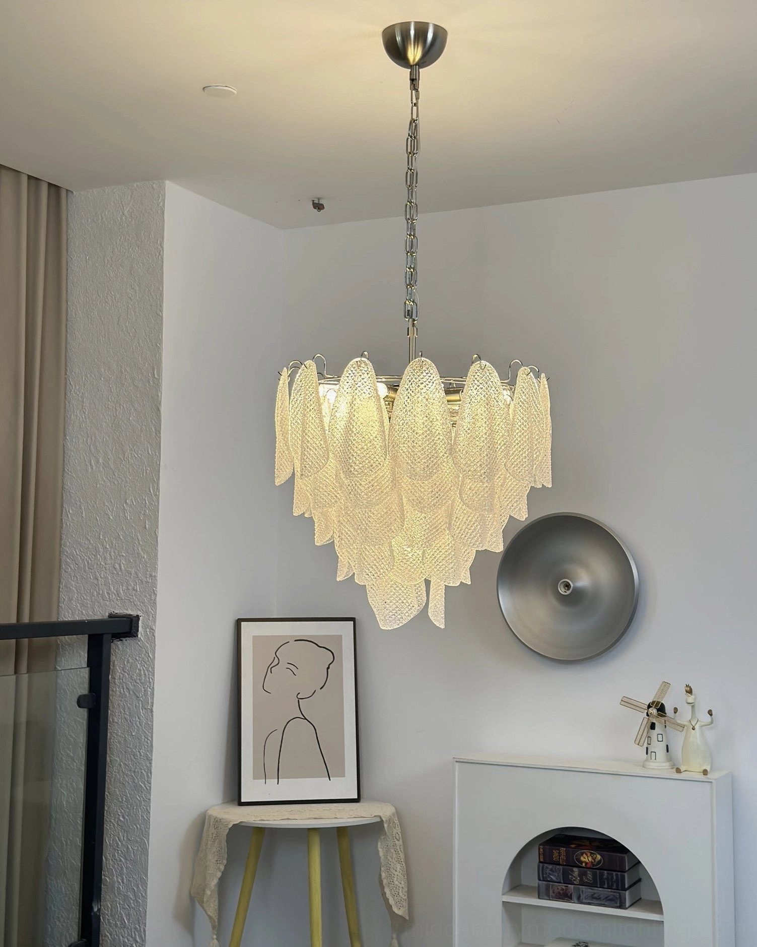 Vianna ripple glass chandelier artistic composition highlighting glass texture under studio lighting