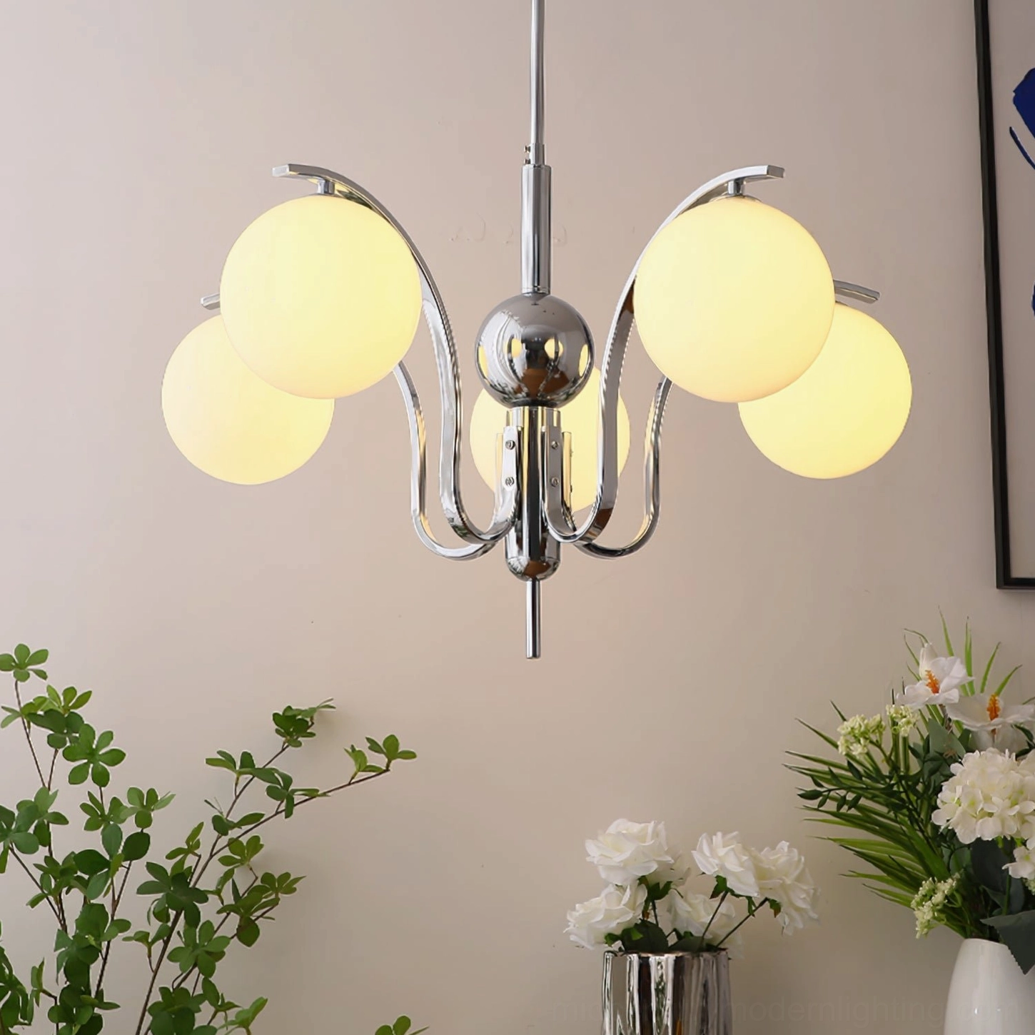 Vintage-inspired glass globe chandelier with warm creamy beige tones and retro chrome finish