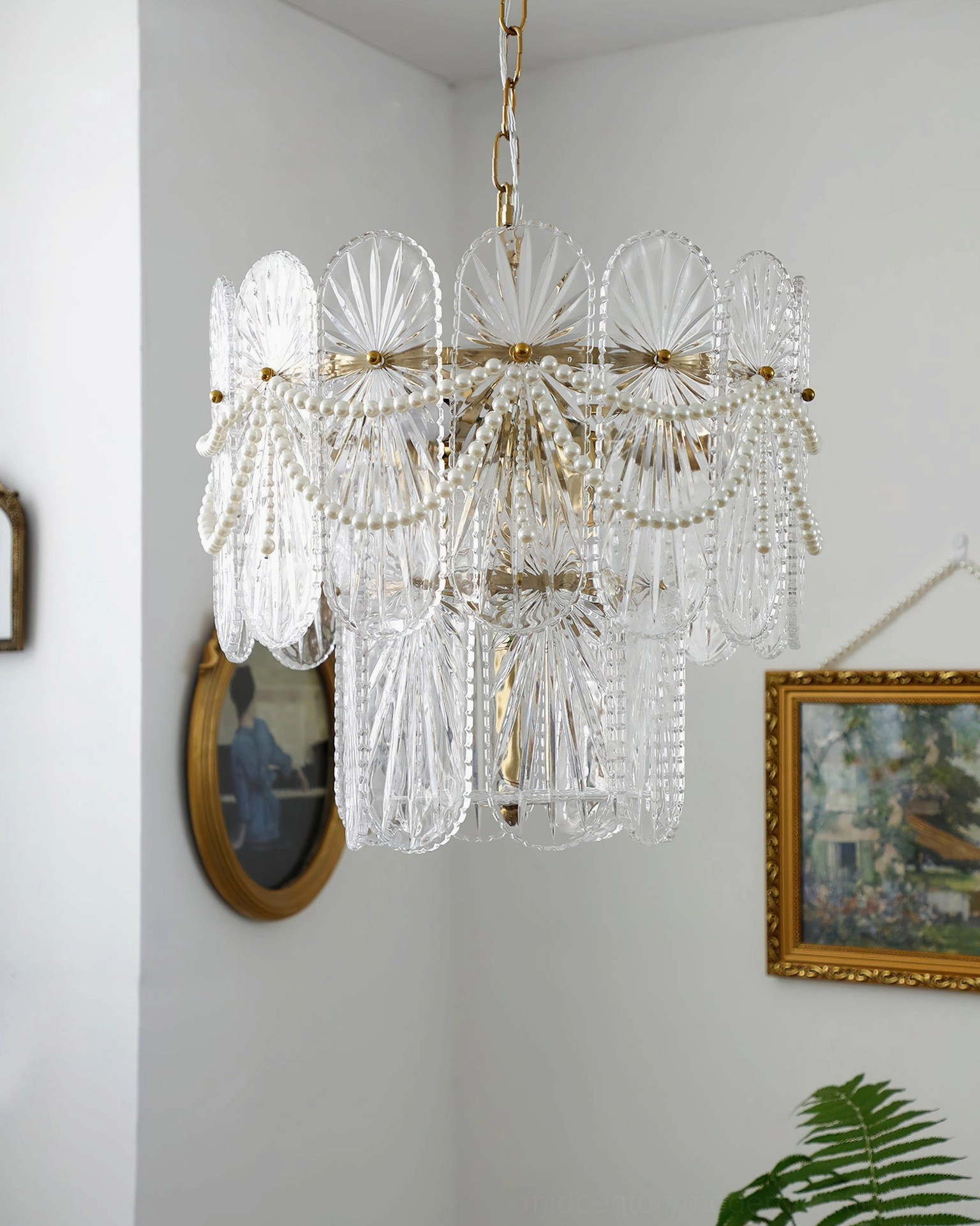Vintage-inspired two-tiered glass chandelier with ribbed texture and gold hardware in cozy room with mirror